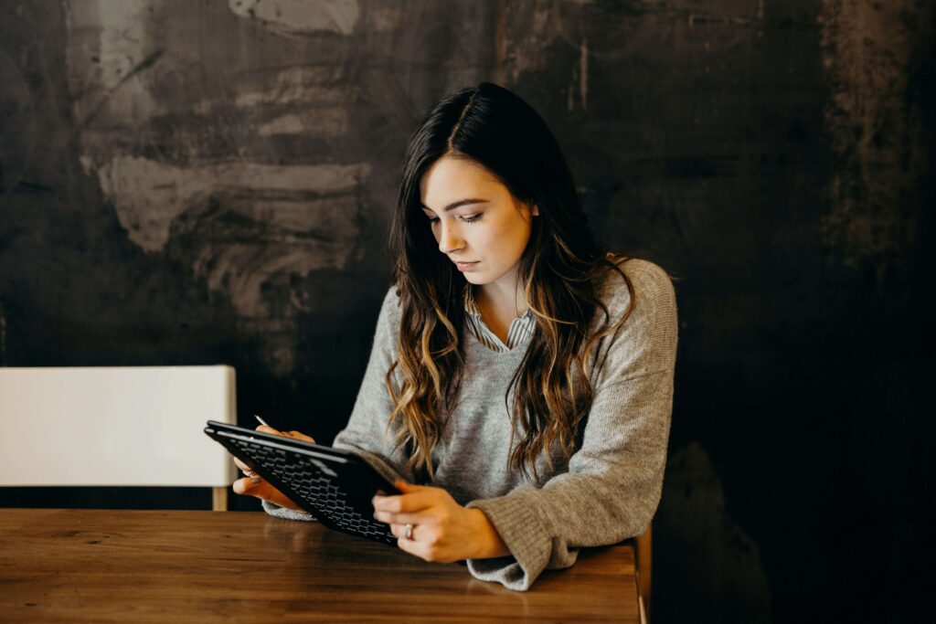 Discover What Benefits You Could Be Entitled To - a woman looking at a laptop